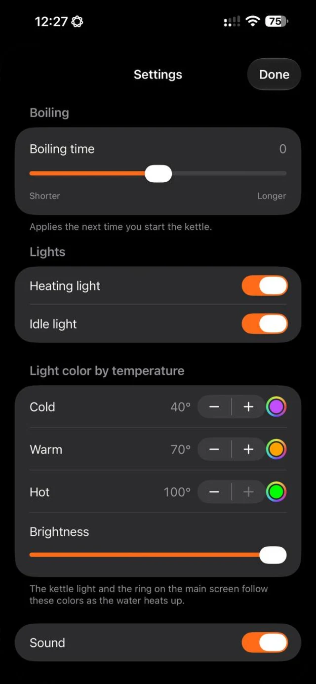 The Settings screen on an iPhone in dark mode with boiling time, heating and idle lights, light colour for cold, warm and hot water, brightness and sound.
